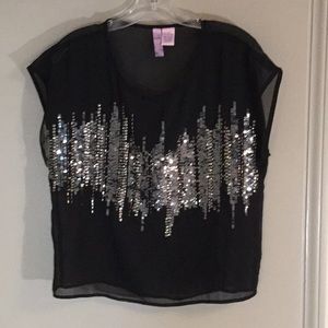 Alya designer Lady’s sheer top; size small.